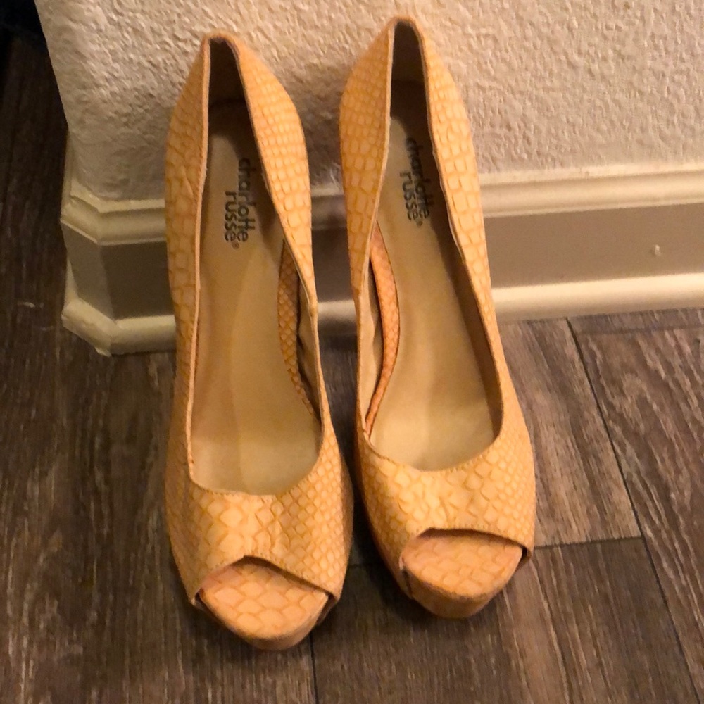 Snake skin platform heels.